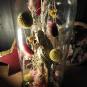 Globe de fleurs séchées - Perroquet doré